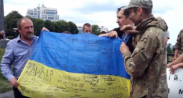 кадр из репортажа о митинге в Киеве