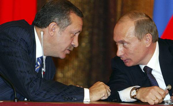 Президент России Владимир Путин и премьер-министр Турции Реджеп Тайип Эрдоган во время встречи с турецкими бизнесменами в Москве