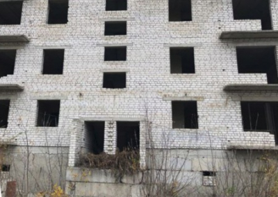 В ЛНР восстановят многоэтажный дом, заброшенный много лет назад